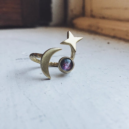 Stars and Moon Orbiting Galaxy Space Ring