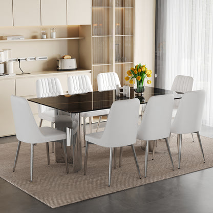 Table and chair set. Modern and Minimalist Dining Table. Imitation Marble Glass Sticker Desktop,Stainless Steel Legs .Paired with 8 White Chairs With PU Cushions And Silver Metal Legs.