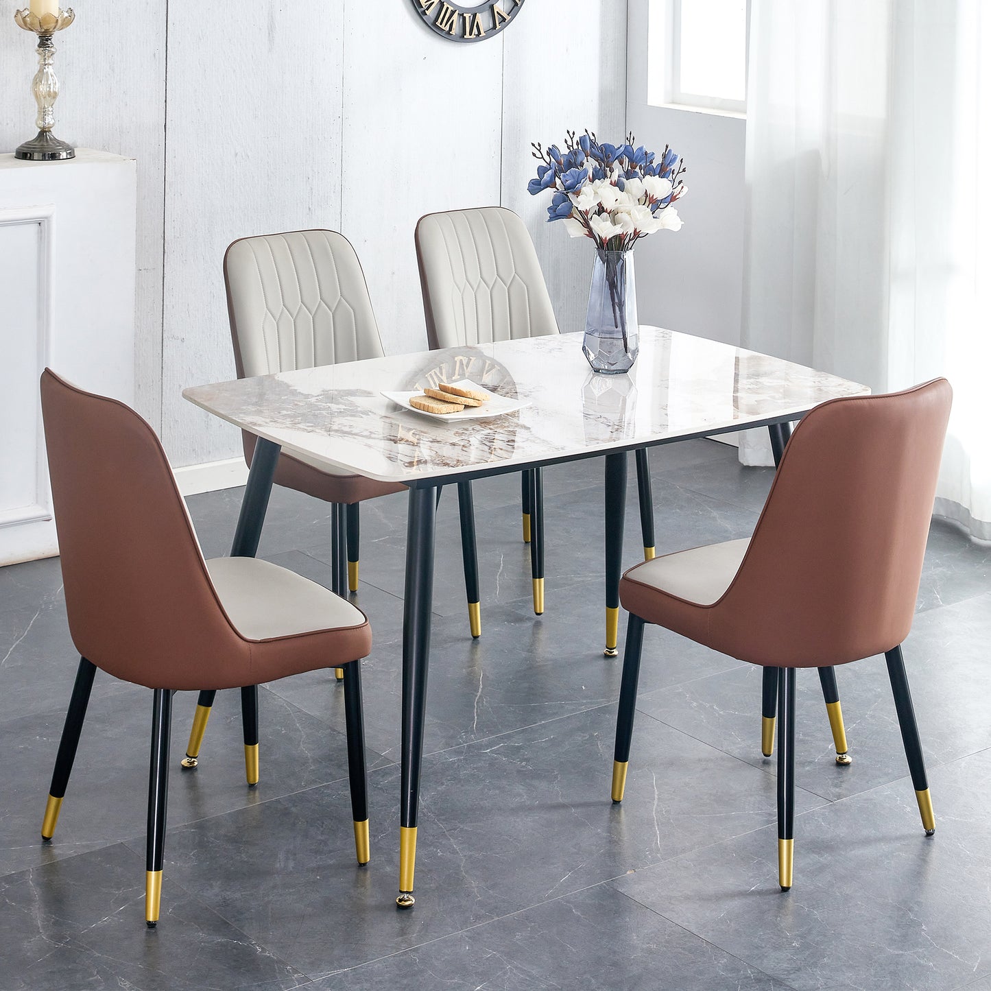Table and chair set.48.4*28 Inch White Sintered Stone Dining Table Set - 4 Brown and Light Gray Spliced Color PU Dining Chairs.