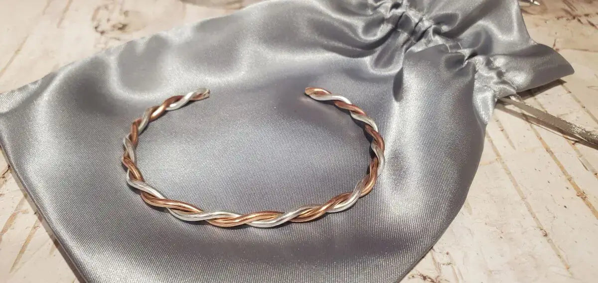 Thick Copper and Sterling Silver Twisted Bangle