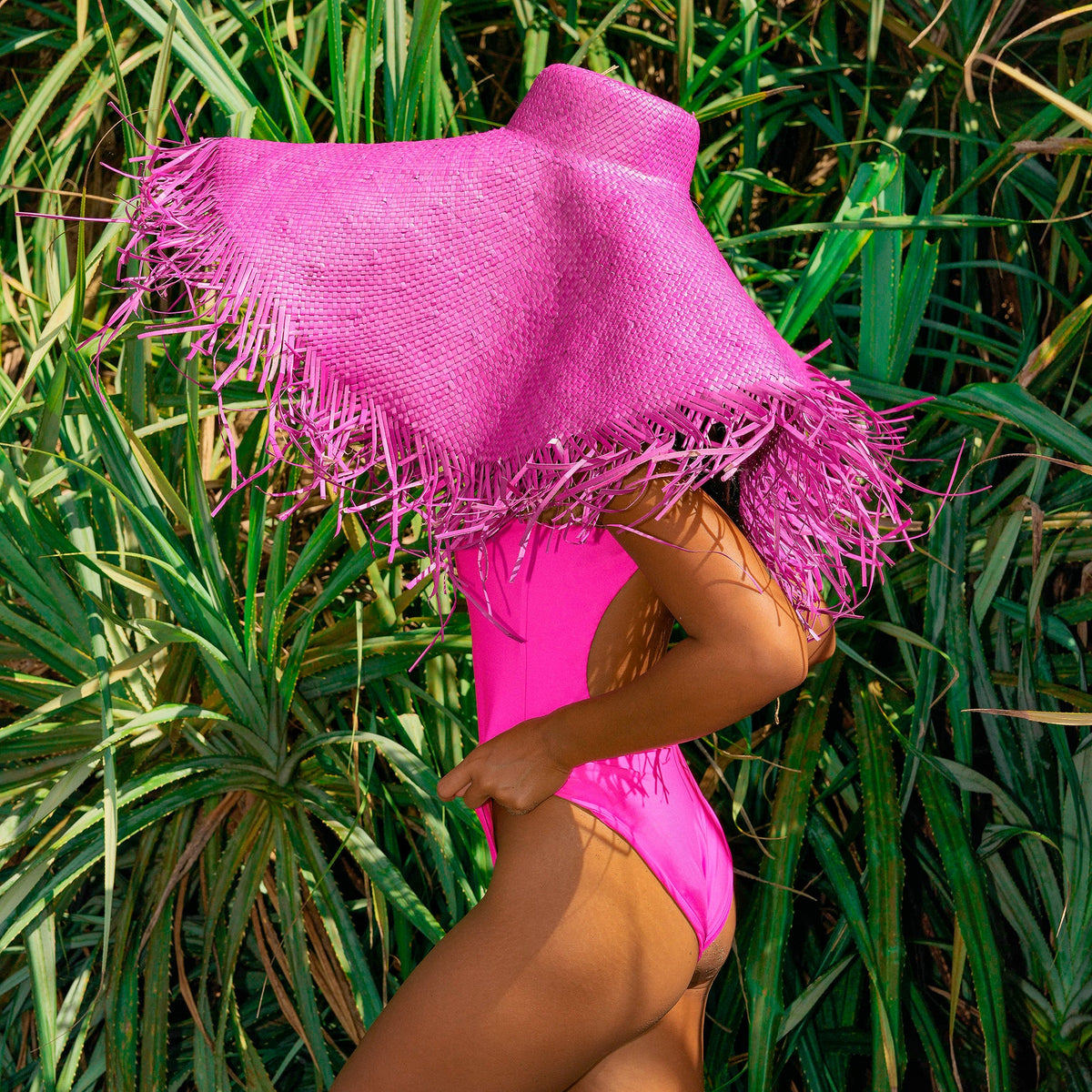 The Jupiter Open-Back Recycled One-Piece Swimsuit in Hot Pink