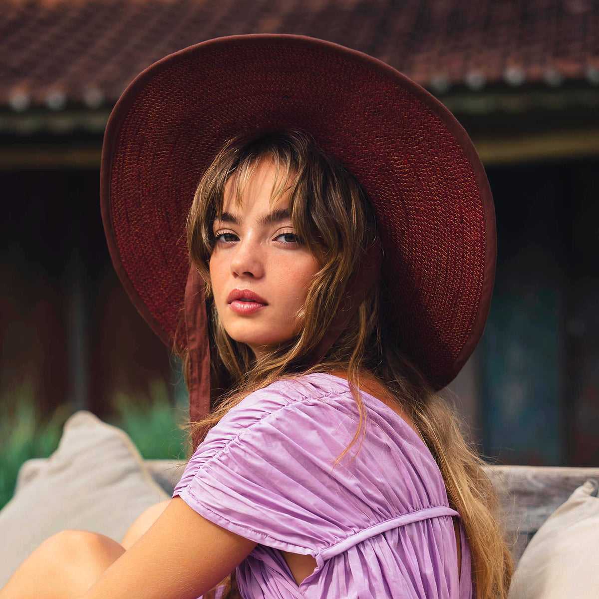 The Lolo Wide-Brim Jute Boater Hat in Burgundy