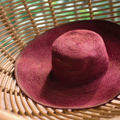The Lolo Wide-Brim Jute Boater Hat in Burgundy