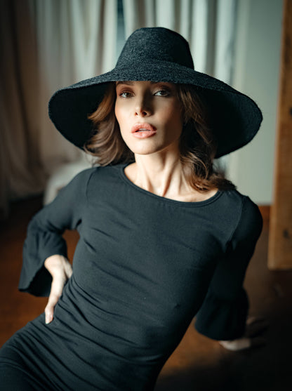 The Riri Jute Handwoven Straw Hat in Black