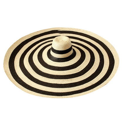 The Solana Oversized Striped Straw Hat in Black & Natural