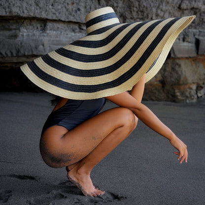 The Solana Oversized Striped Straw Hat in Black & Natural