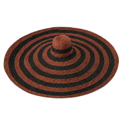 The Solana Oversized Striped Straw Hat in Brown & Black