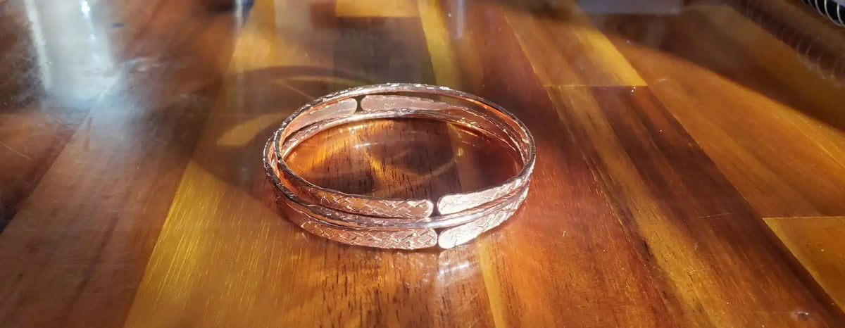 Stackable Copper Hammered Open Double Canted Angle Bangles
