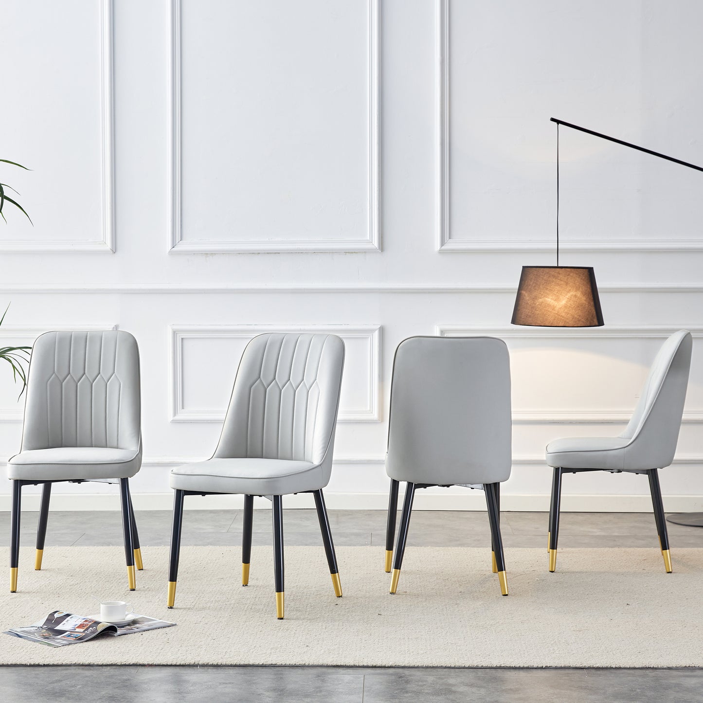 Modern dining chairs are equipped with light gray PU artificial leather backrest cushions and black metal legs, suitable for restaurants,kitchens,and bedrooms.Set of 4pieces W1151P147209